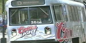 Bus wrapped with an alcohol ad